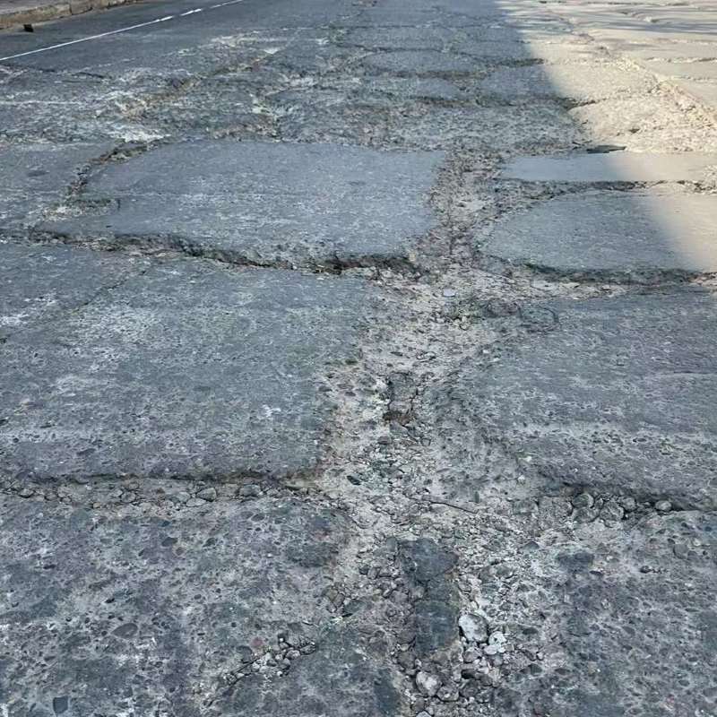 上甘岭路面起砂露石子修补料